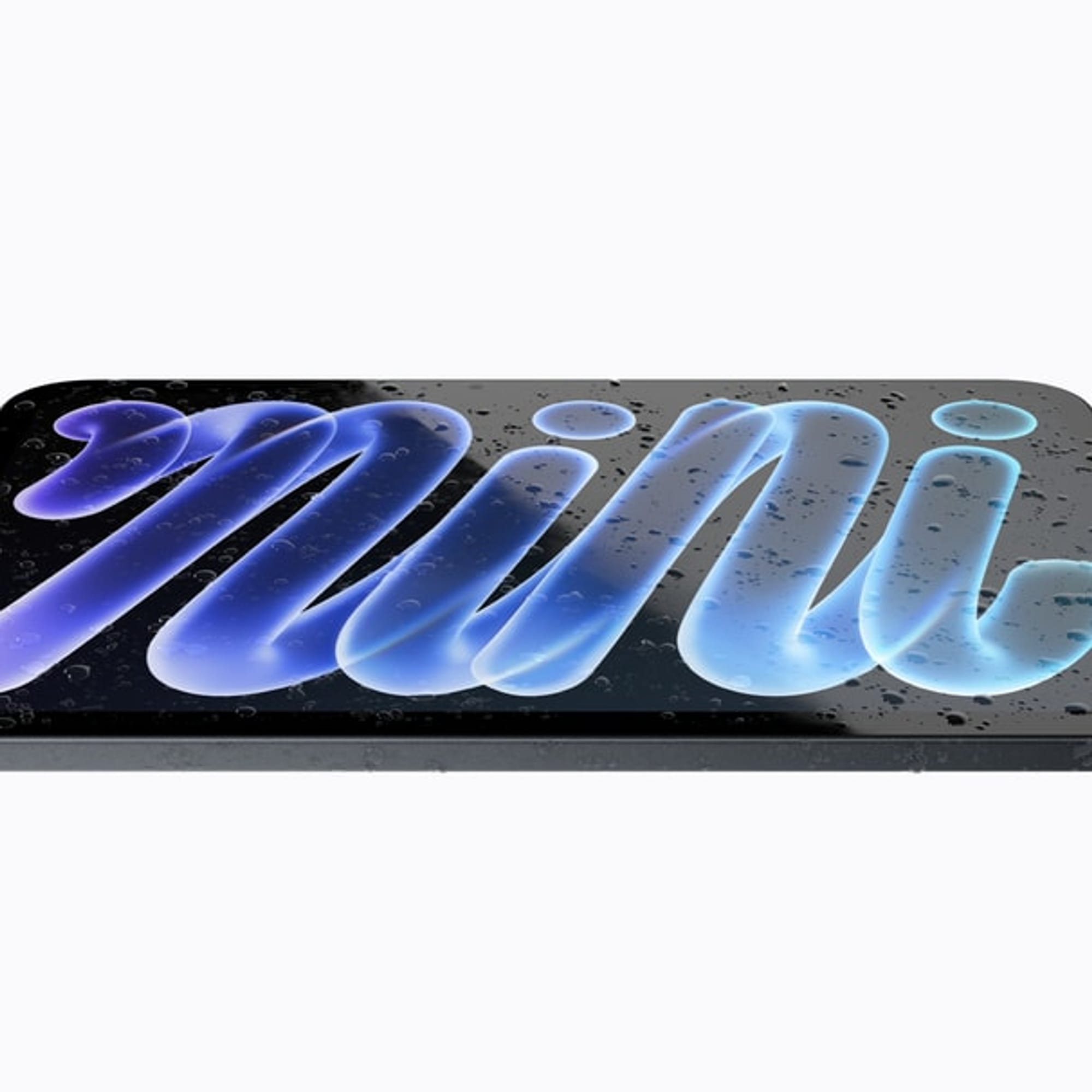 The new iPad mini lying flat with water droplets on it