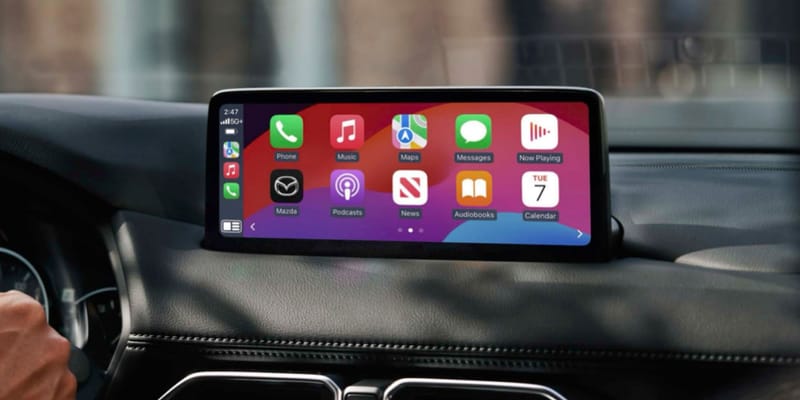 The Great CarPlay Holdout: Why Tesla and Rivian Are Betting Against What Buyers Want